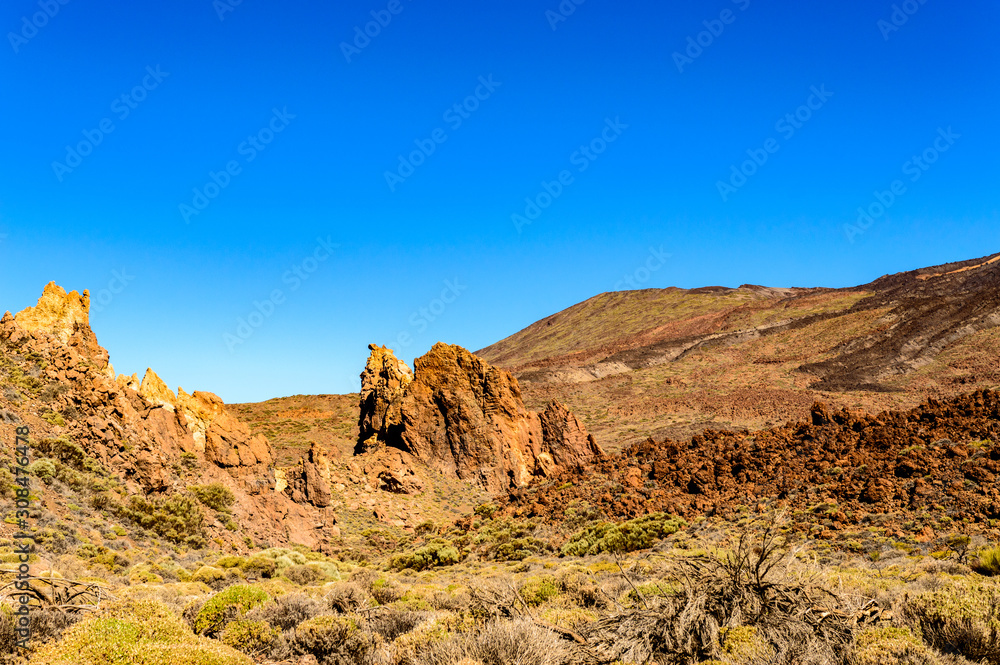 Portrait Of A Beautiful Volcanic Rock Formation In The Form Of A Camel On A Sunny And Very Clear Day In El Teide National Park. April 13, 2019. Santa Cruz De Tenerife Spain Africa. Travel Tourism 