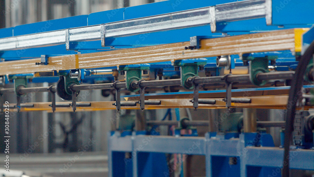 Naklejka premium Bending machine for corrugated metal sheets in the production plant