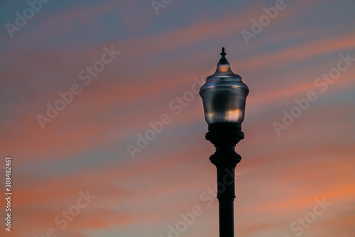 old street lamp on the background of sky