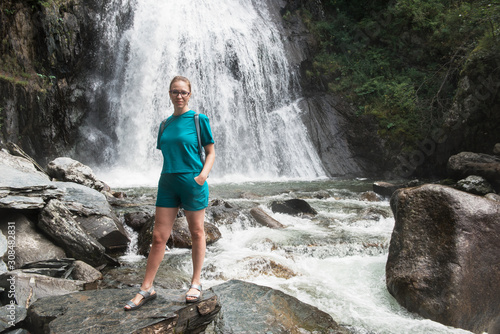 Woman at Korbu Waterfall on...