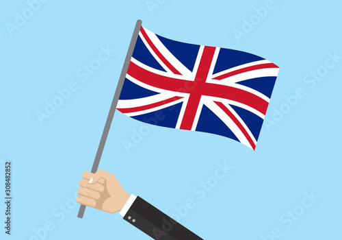 UK waving flag. Hand holding British flag. National symbol of Great Britain. Vector illustration.