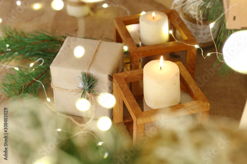 Christmas candles with evergreen decorations.