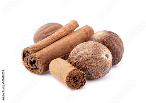 Cinnamon and nutmeg on white background. Spices isolated.