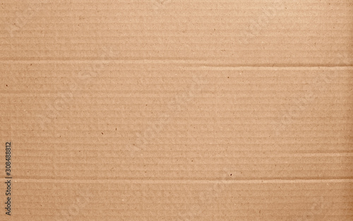 Brown cardboard sheet abstract background, texture of recycle paper box in old vintage pattern for design art work. photo