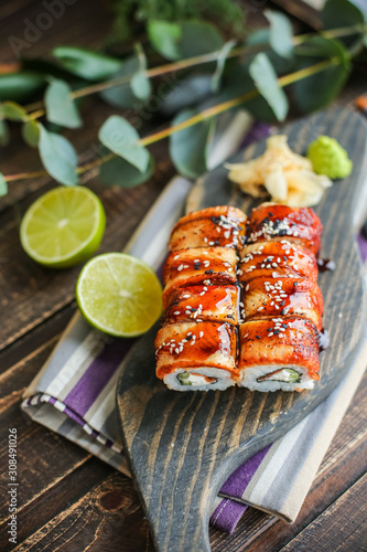 sushi with salmon and avocado. Sushi roll with salmon and tempura shrimp