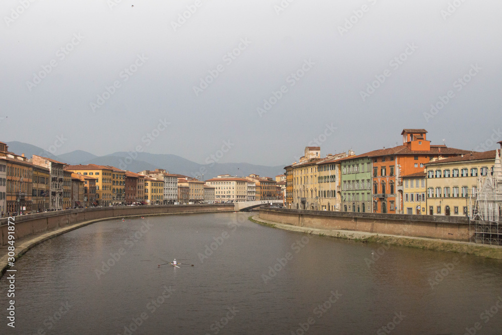 Fototapeta premium Day view over Arno river in Pisa, Tuscany, Italy