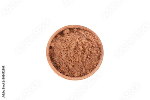 Wooden bowl with cocoa powder isolated on white background