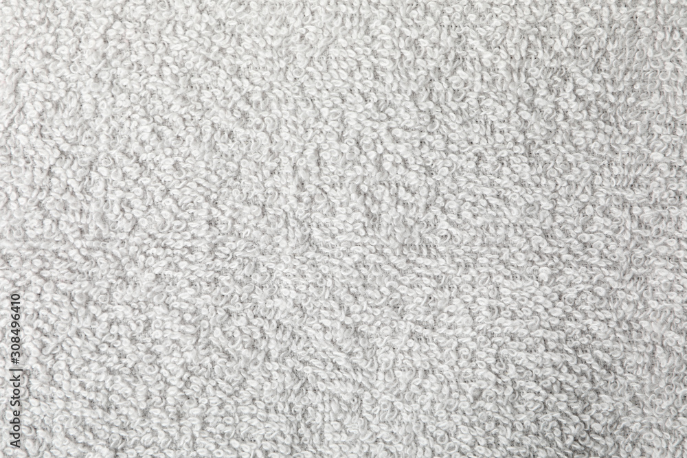 Grey towel textured background, closeup and space for text Grey towel textured background, closeup and space for text