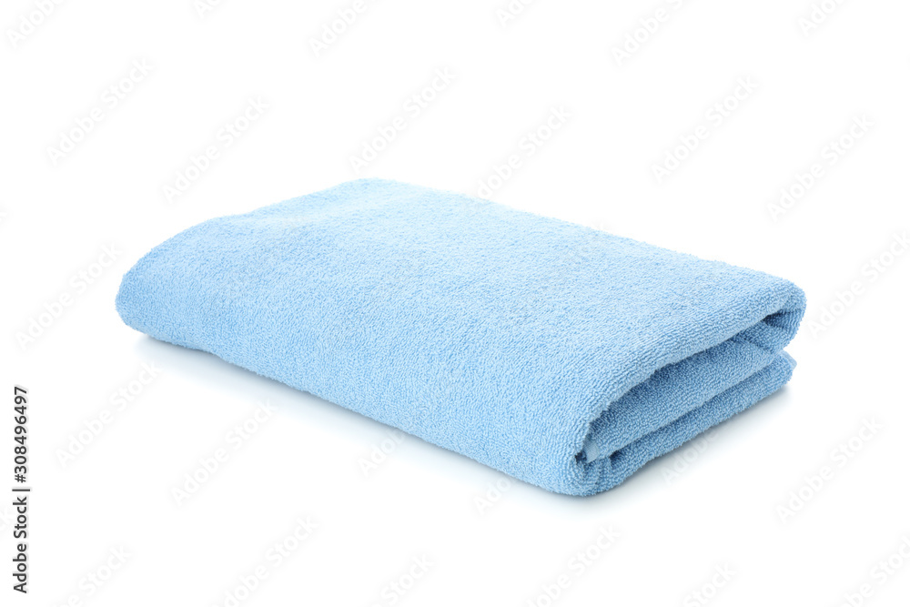 Folded blue towel isolated on white background, close up Folded blue towel isolated on white background, close up