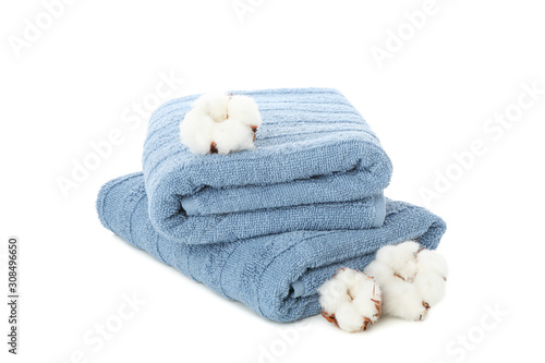 Folded blue towels and cotton isolated on white background