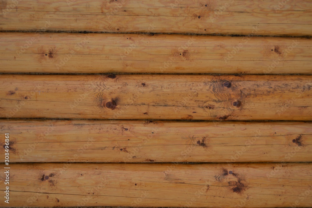 Obraz premium Wooden logs of natural color. Background and texture.