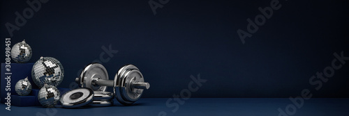 Dumbbell and mirror balls. Fitness New Year and Christmas background. Extra wide panorama banner background