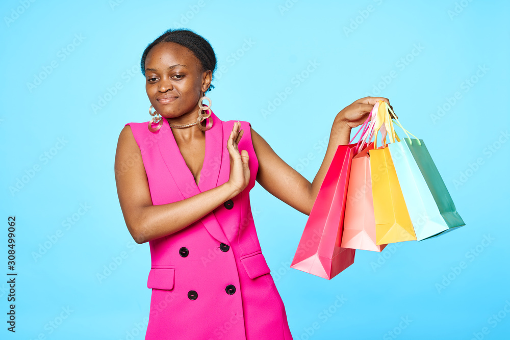 young woman with shopping bags