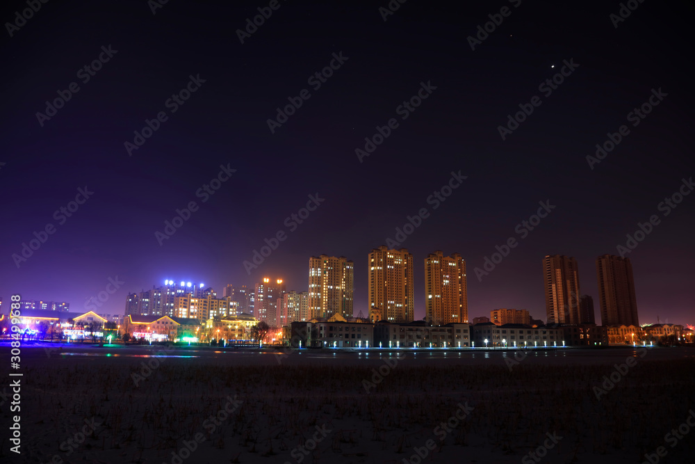 Obraz premium Night scenery of waterfront cities