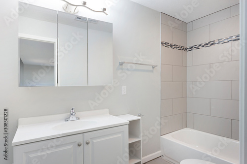 White Bathroom With White Tile