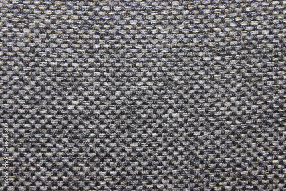Thick fabric with white and black threads. Macro. Russia. Thick fabric with white and black threads. Macro. Russia.