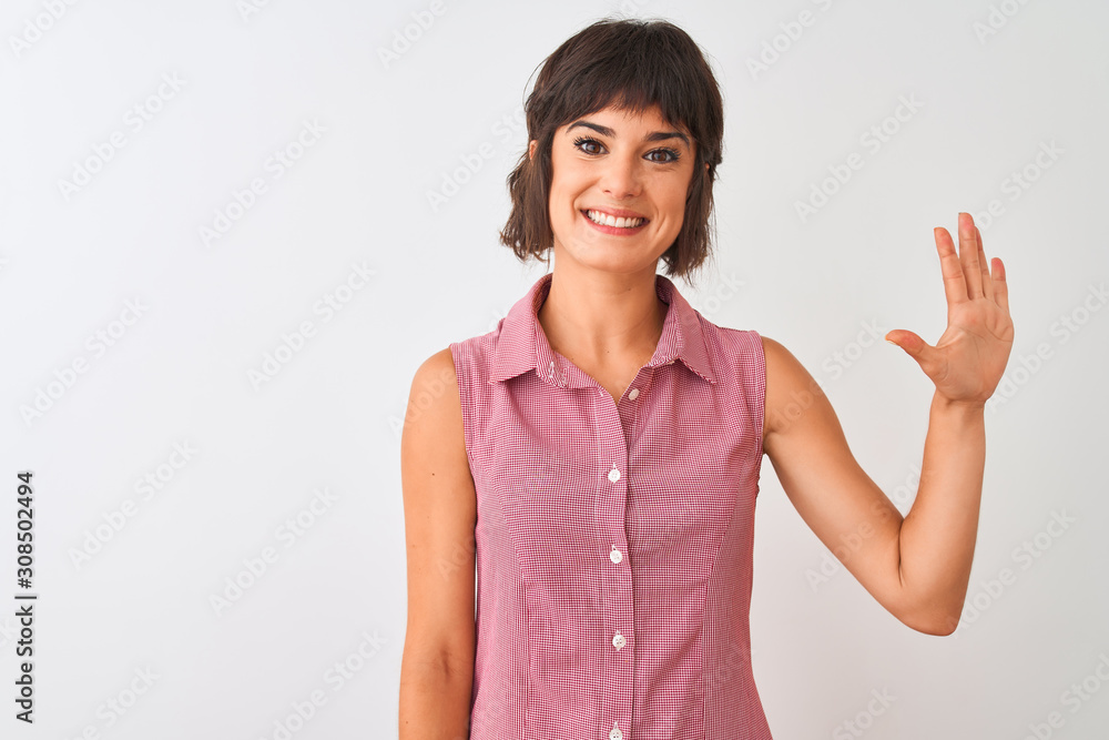 Young beautiful woman wearing red summer shirt standing over isolated white background showing and pointing up with fingers number five while smiling confident and happy. Young beautiful woman wearing red summer shirt standing over isolated white background showing and pointing up with fingers number five while smiling confident and happy.
