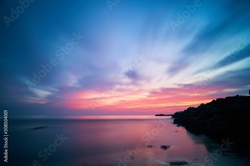 sunset over the sea © marcotjoanda