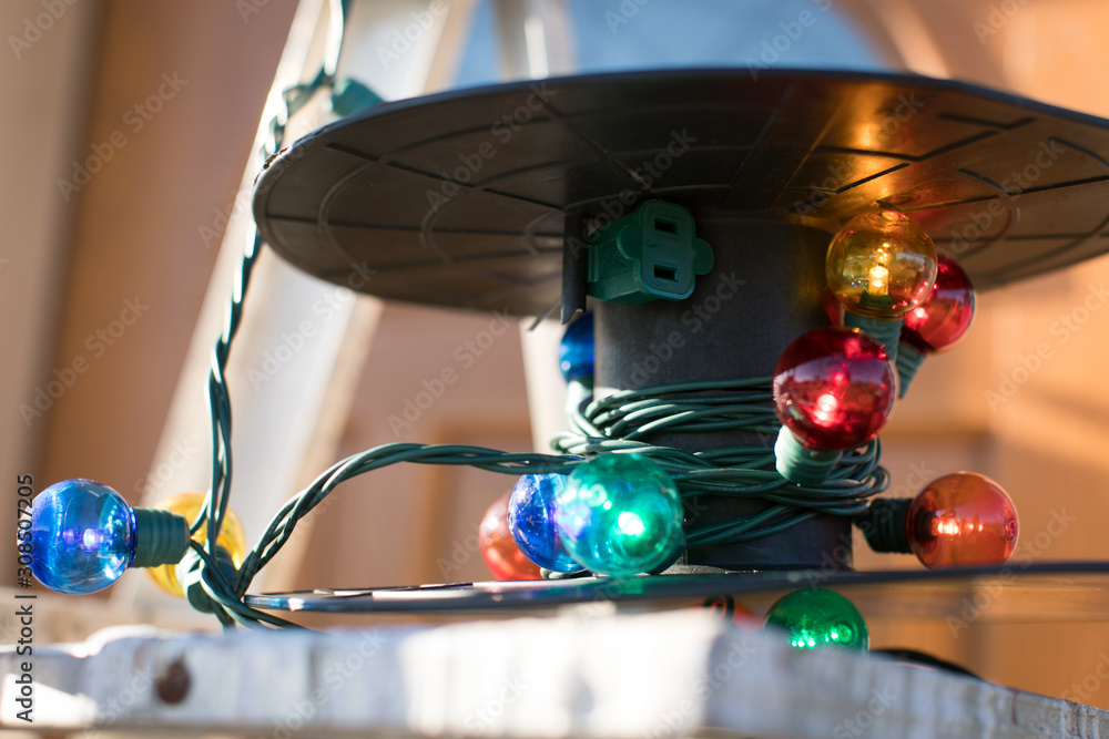 Close up of christmas lights on spool Close up of christmas lights on spool