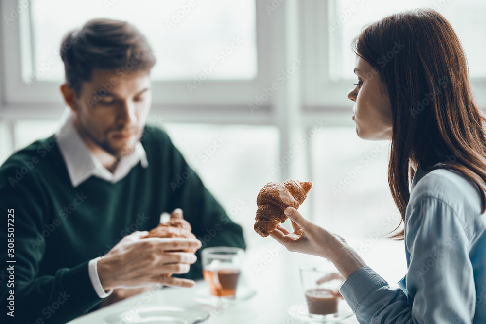 young couple having dinner in restaurant