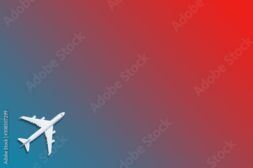 Airplane model. White plane on red background.