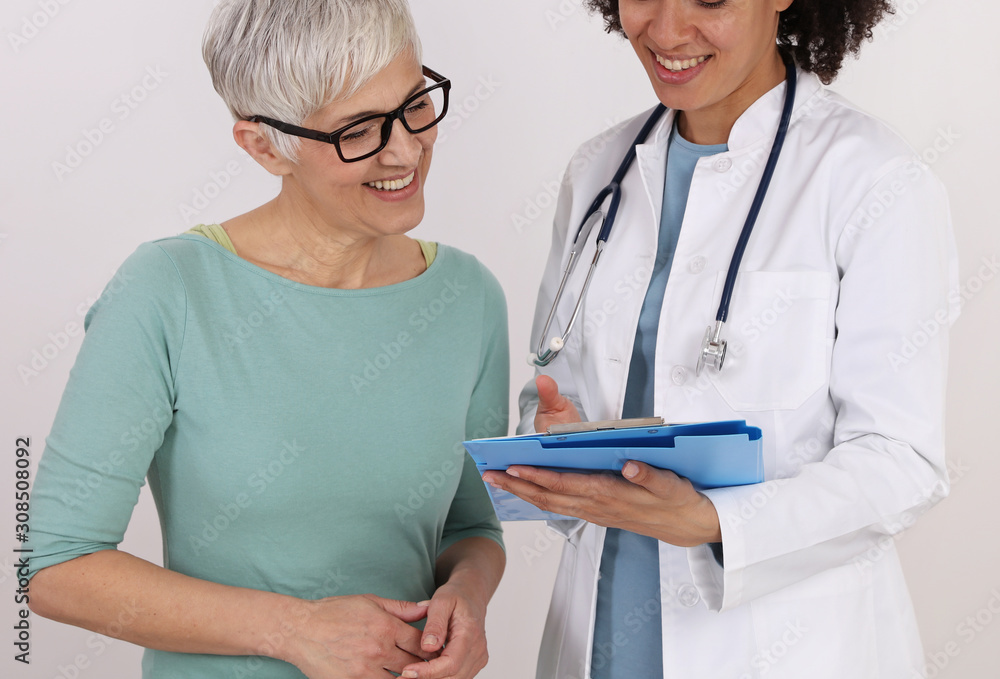 Doctor and mature female Patient talking .Professional medical help, Female health , Gynecology concept Doctor and mature female Patient talking .Professional medical help, Female health , Gynecology concept