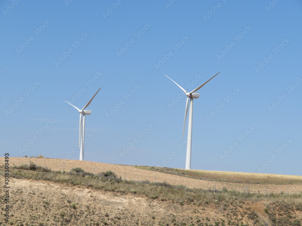 Beautiful wind turbines ready to convert the air the energy Beautiful wind turbines ready to convert the air the energy