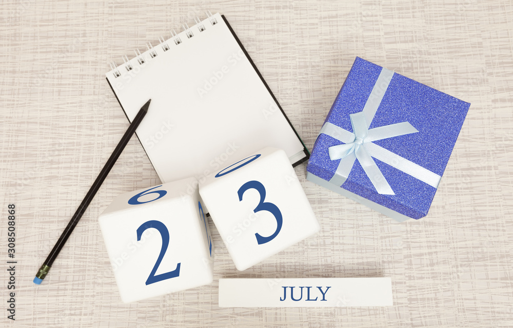 Calendar with trendy blue text and numbers for July 23 and a gift in a box.