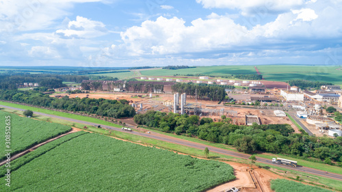 Sugar cane industrial mill processing plant in Brazil. Sugarcane plant producing renewable energy. Ethanol.