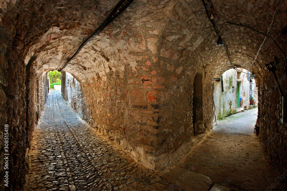  Beautiful alley in the medieval village of Mesta, one of the most beautiful 