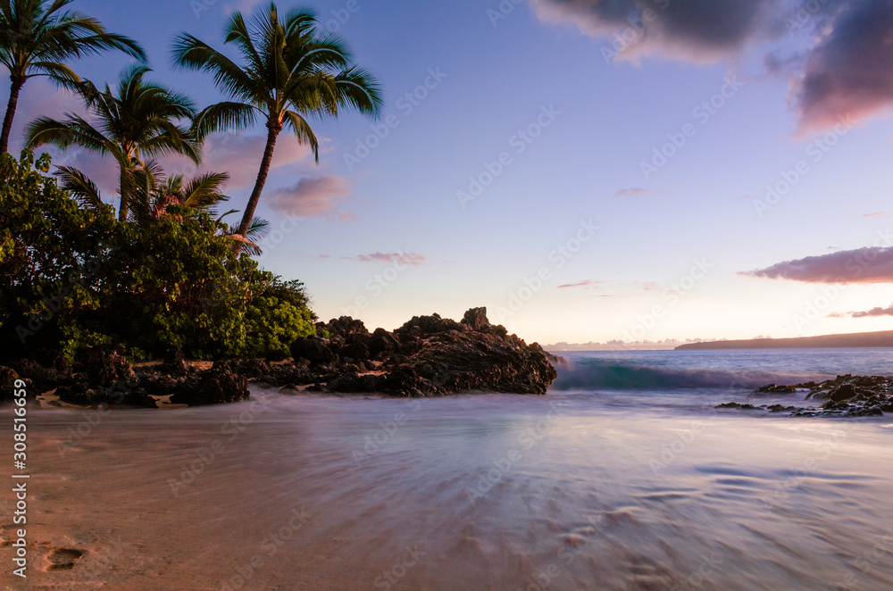 Sunset view of beautiful tropical beach, Secret Wedding Beach, Makena Cove, Maui, Hawai