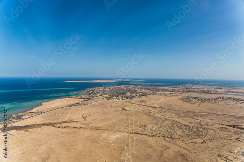 City of Hurghada, Egypt (Al-Bahr al-ahmar) located on red sea coast under control of red sea government  a famous tourist destination - aerial view 