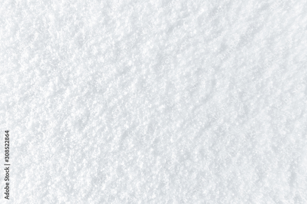 Fototapeta premium Fresh snow background with small snowflakes texture