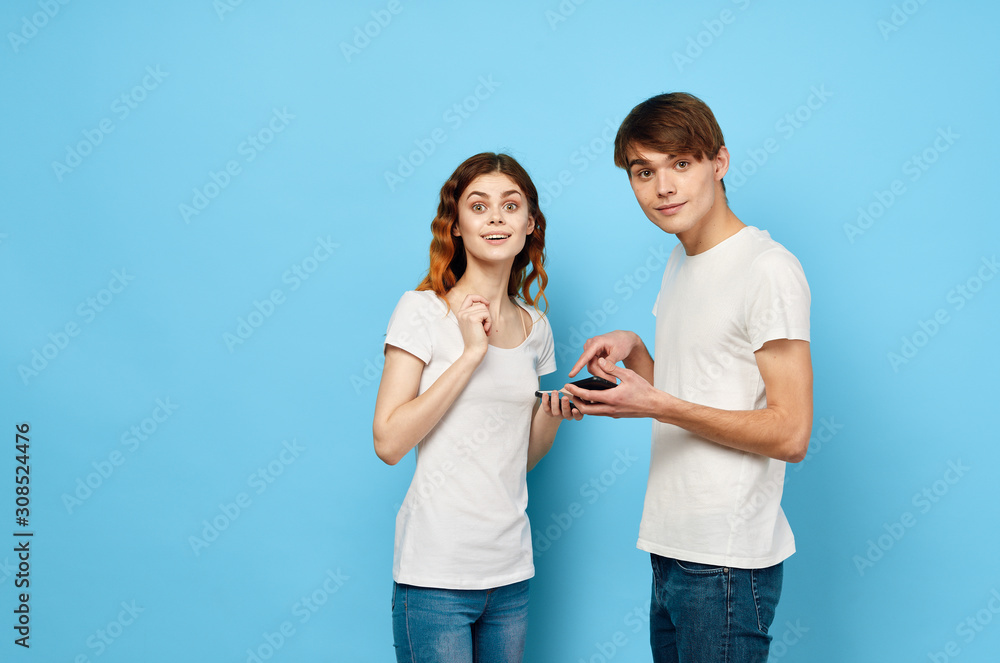 man and woman in t-shirts man and woman in t-shirts