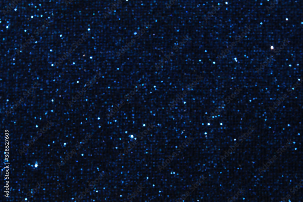 Obraz premium glitter classic blue lights background. de-focused. color of the year 2020