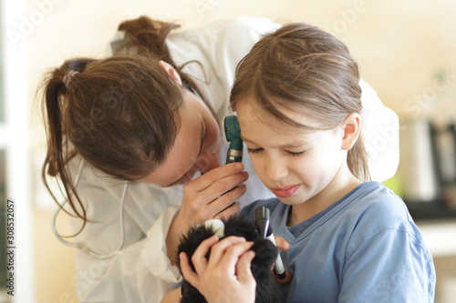 Germany, Girl at the pedeatrician photo