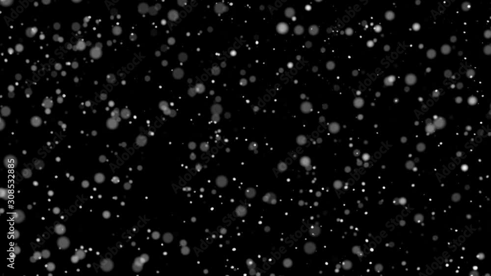 Slow motion of natural organic dust particles on black background. Filmed on high speed cinema camera Slow motion of natural organic dust particles on black background. Filmed on high speed cinema camera