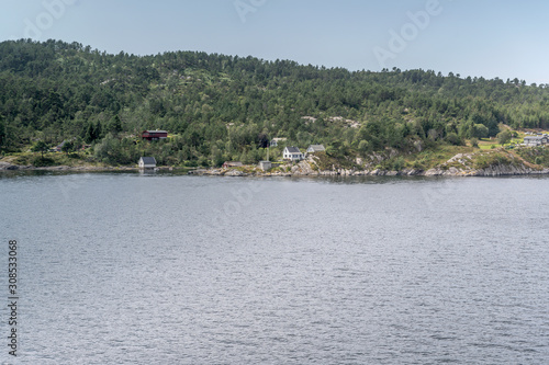 Wallpaper Mural house on green fjord shore, Holsnoy, Norway Torontodigital.ca