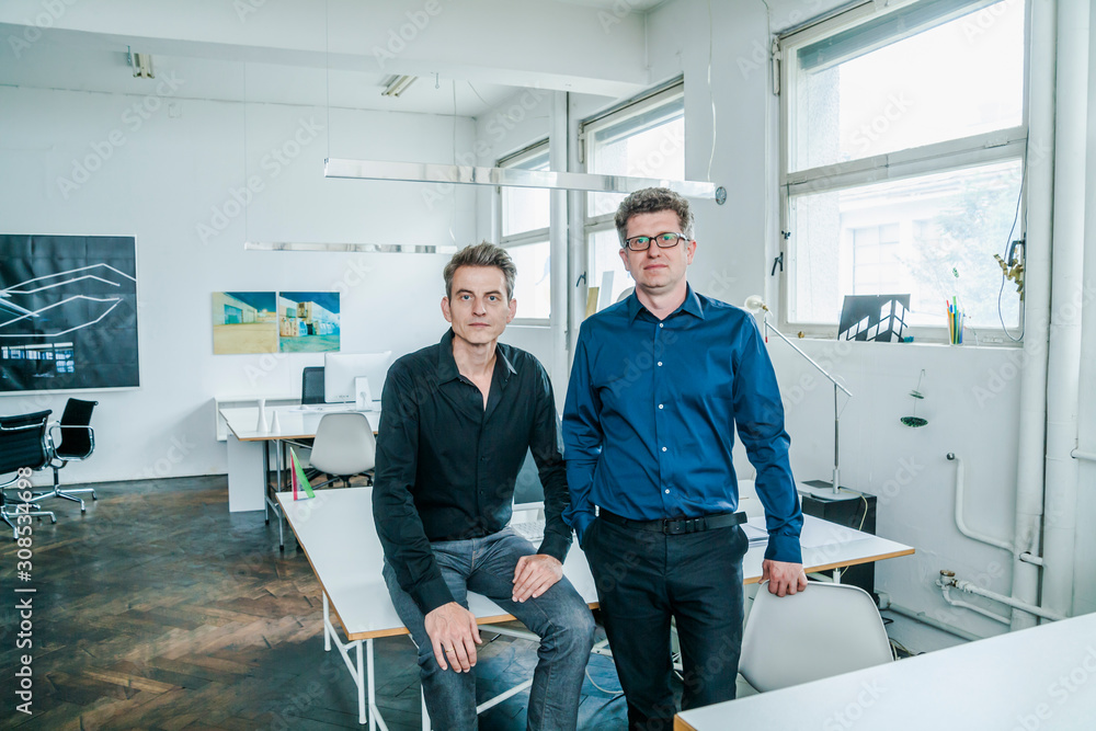Portrait of two designers in their studio Portrait of two designers in their studio