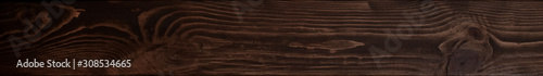 Dark brown wood Board texture.Photo