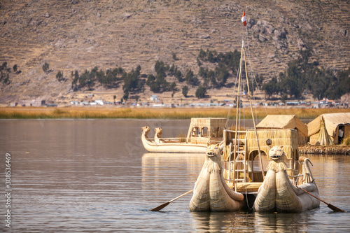 The boats and floating islands of Uros on Lake Titicaca, Peru. photo