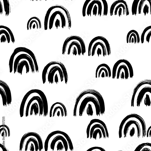 Black and white paint arcs vector seamless pattern. Monochrome rainbow shape black ink smudges background.