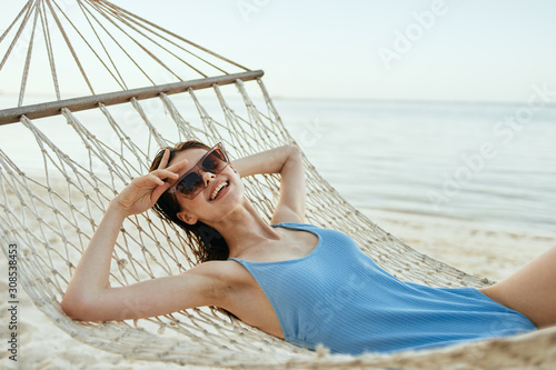 woman relaxing on the beach © SHOTPRIME STUDIO
