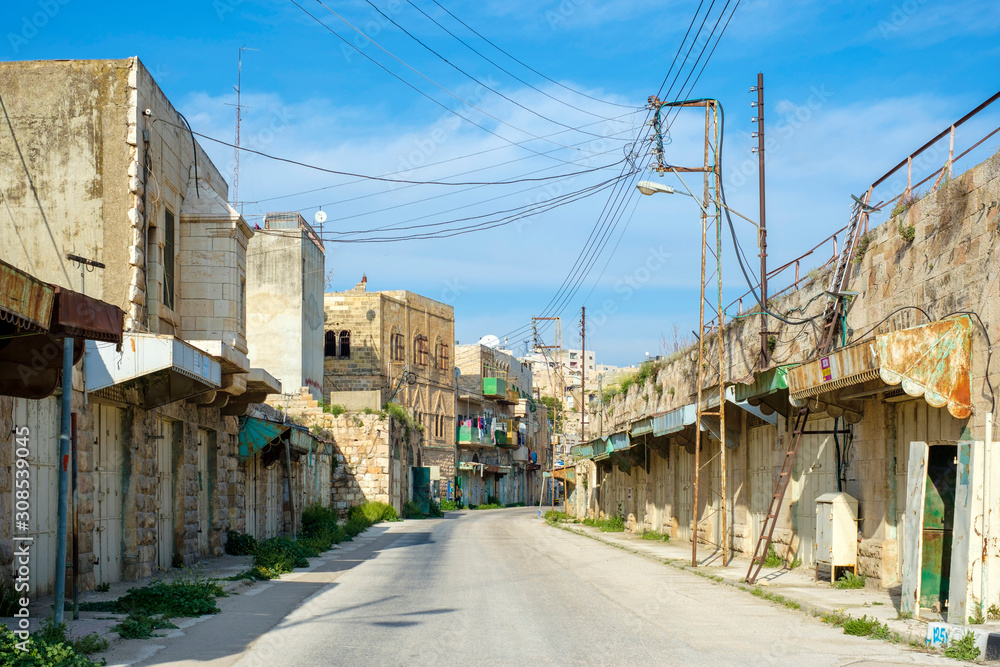 Empty shops and buildings on Shuhada Street, Hebron, West Bank, Palestine Empty shops and buildings on Shuhada Street, Hebron, West Bank, Palestine