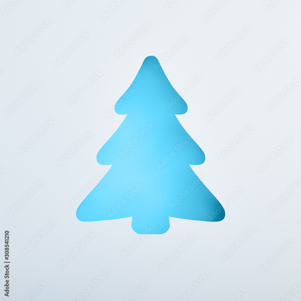 Xmas blue tree shape. Square composition, flat lay, view from above. Xmas blue tree shape. Square composition, flat lay, view from above.
