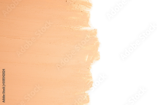 Liquid foundation texture. Make up for women. Top view. Isolated on white. Space for text or design.