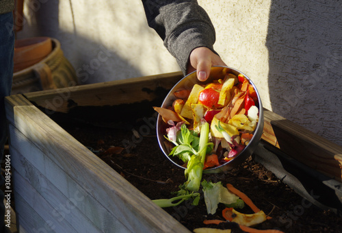 Obraz na płótnie Kitchen waste recycling in composter