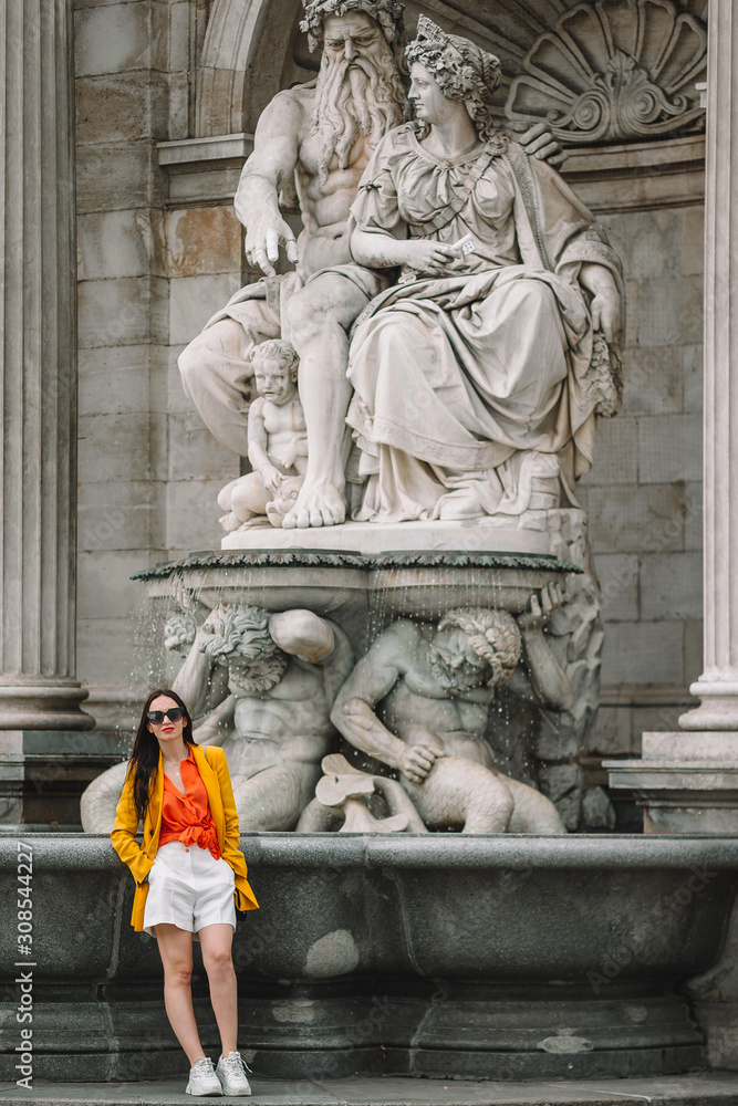 Naklejka premium Young woman in Vienna outdoors during holidays in Europe.