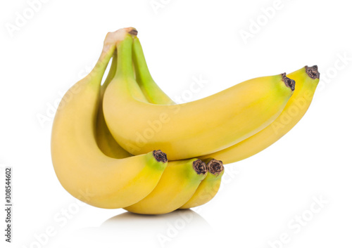 Fresh ripe organic bananas cluster on white background with reflection.