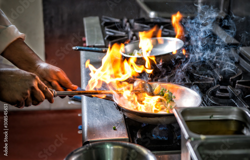 Preparing meal in flame